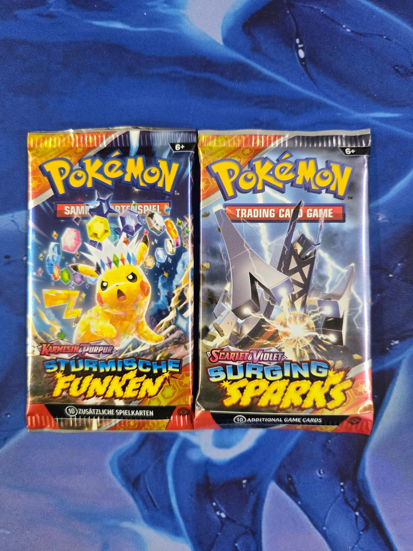 Boosterpack SV08 - Surging Sparks (Englisch)